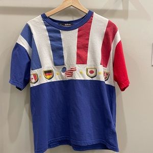 Vintage Embroidered Disney Tee (rare) - M/L (Epcot Flags Color Block Tee, 70s)